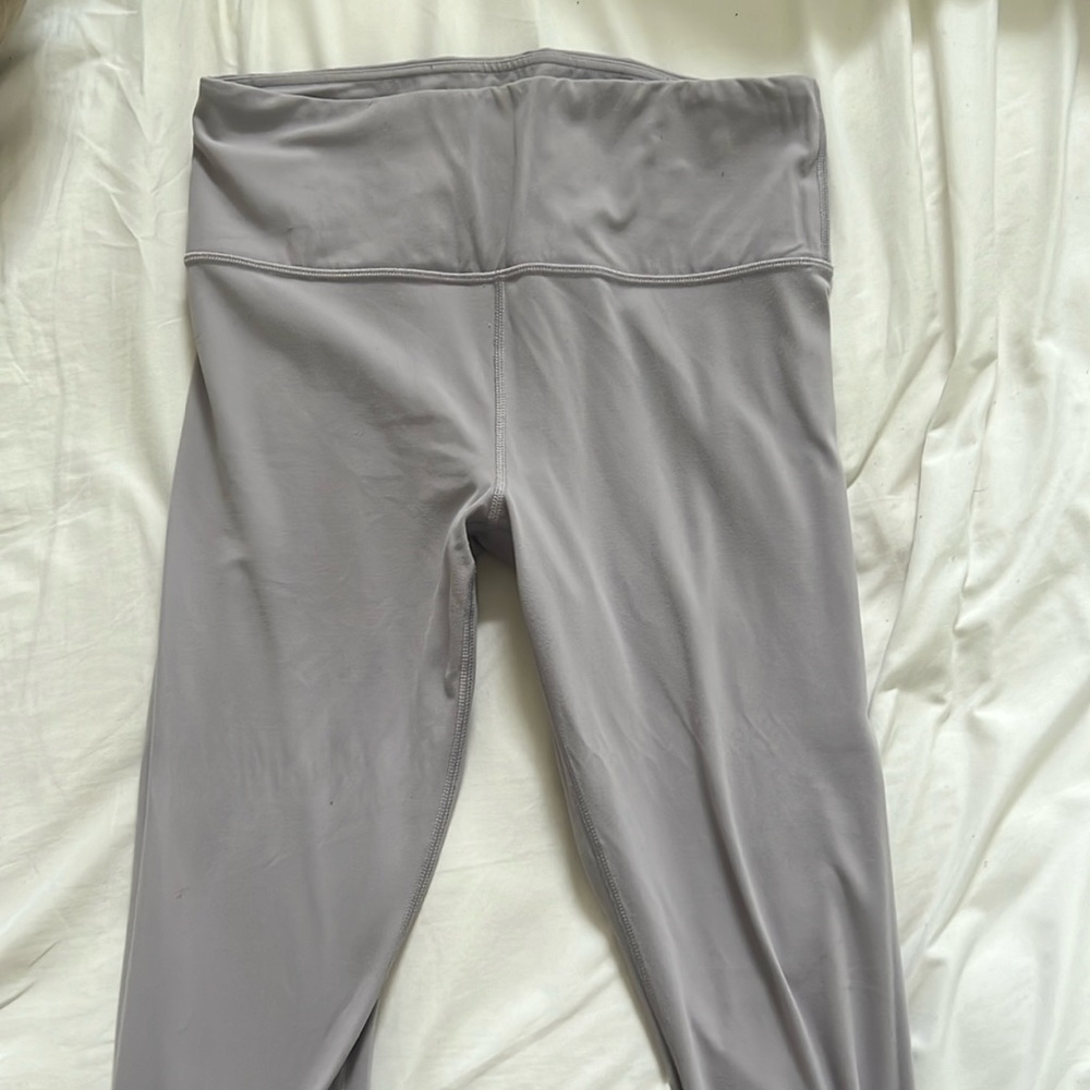 Full length high rise Athleta leggings. Very light purple.